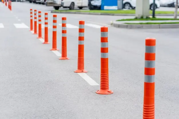 row-bright-orange-traffic-bollards-city-street_651454-4391.webp